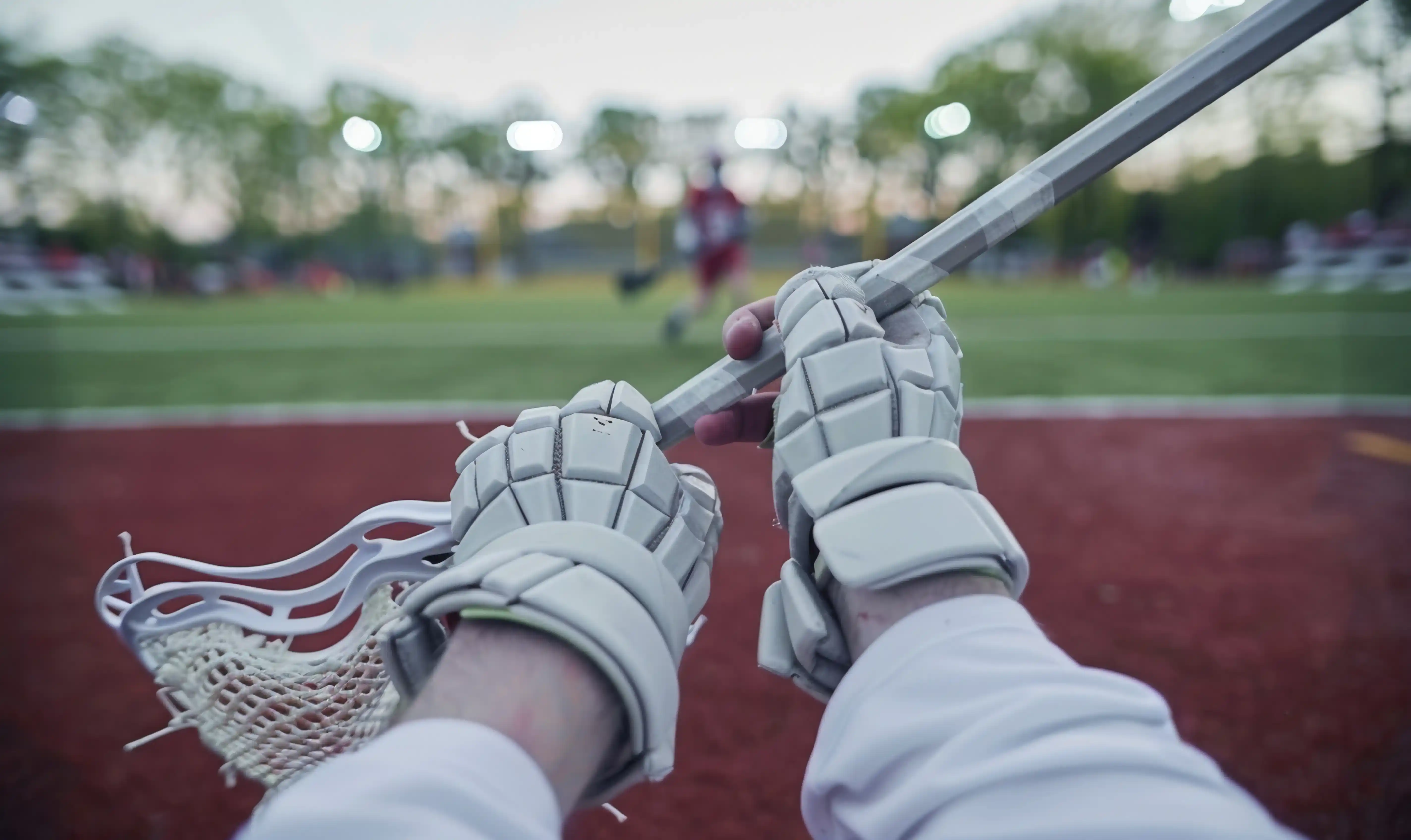 Lacrosse player sprinting